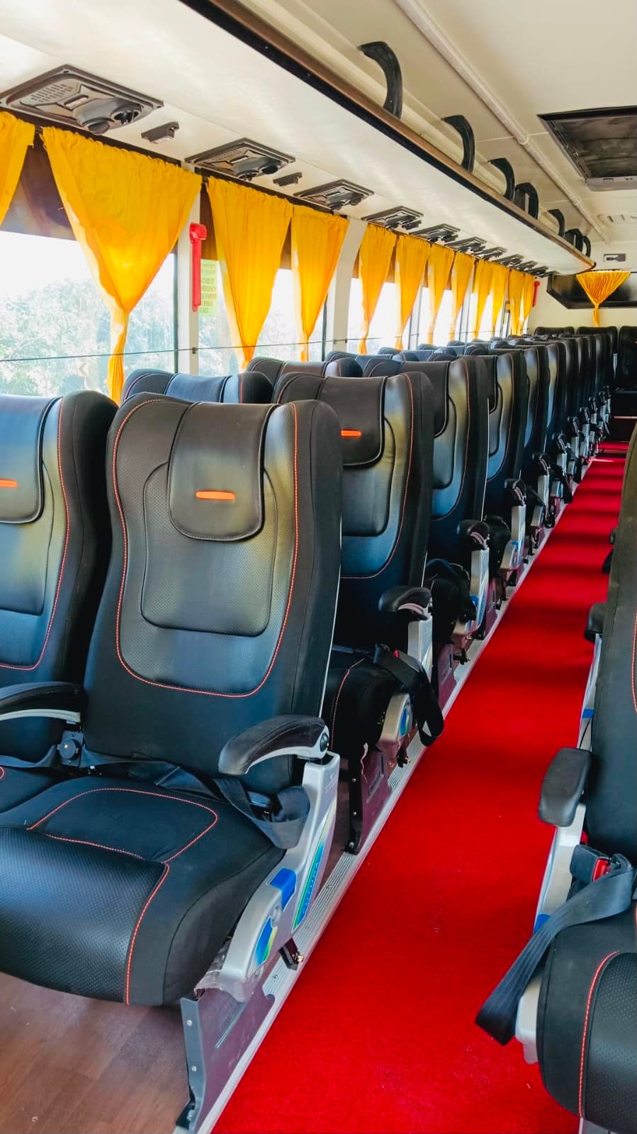 Qutbi Travels bus interior seating with pushback seats